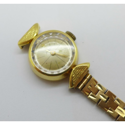 1124 - A lady's 18ct gold cased wristwatch, case 6.4g without movement, and one half of a 9ct gold bracelet... 