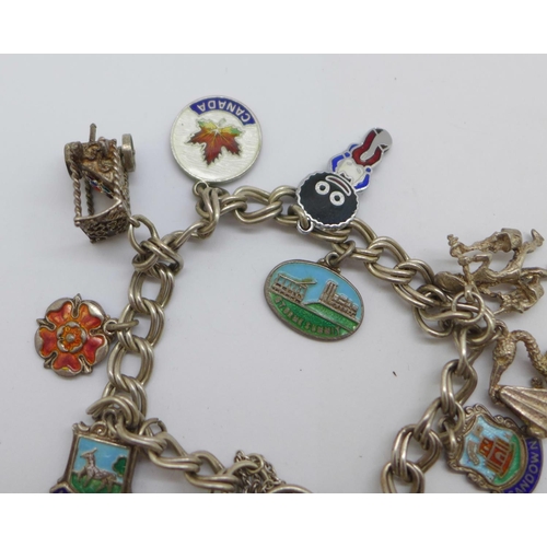 1134 - A silver charm bracelet, 44g