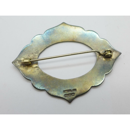 1135 - A silver and enamel brooch, 65mm x 50mm