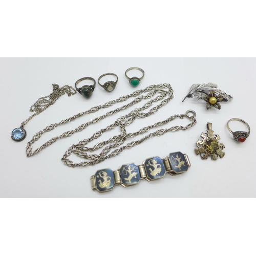 1141 - A silver chain, four rings, a bracelet, a thistle pendant, a blue stone set pendant and chain and a ... 