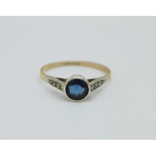 1166 - A 9ct gold and silver, blue and white stone ring, N