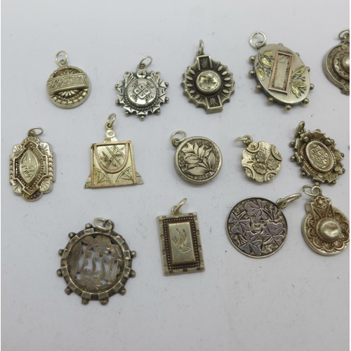 1189 - Victorian brooch, pendants and charms, (test as silver), some hallmarked