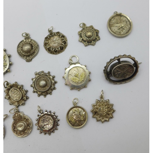 1189 - Victorian brooch, pendants and charms, (test as silver), some hallmarked