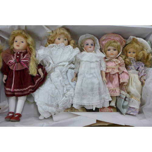 1191 - An early 20th Century German doll, 370 AM 3/0 DEP impressed mark and four other modern dolls and one... 