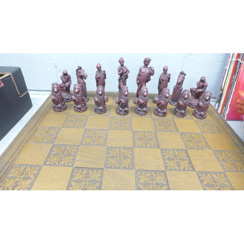 1224 - A large wooden chess board and chessmen