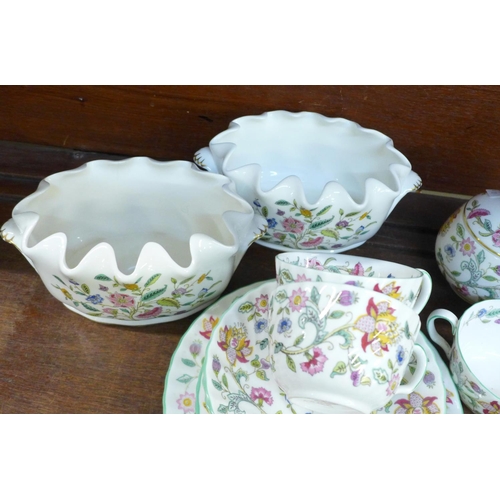 657 - Minton Haddon Hall china; three cups, saucers and side plates, two tea plates, sugar bowl and two pl... 