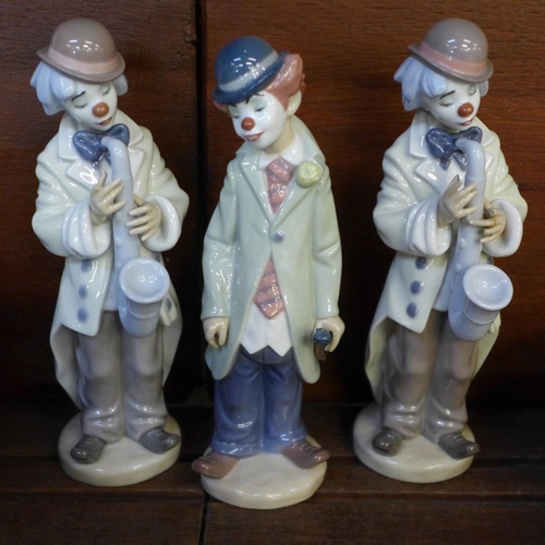 670 - Four Lladro figures and one other, all a/f