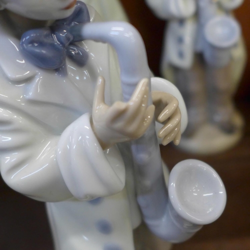 670 - Four Lladro figures and one other, all a/f