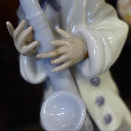 670 - Four Lladro figures and one other, all a/f