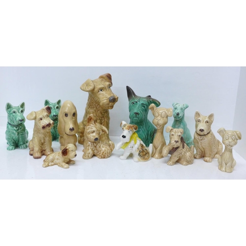 688 - A collection of fourteen Sylvac dog figures, two a/f