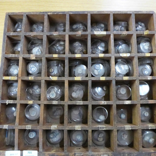 701 - A large tray of pocket watch glasses