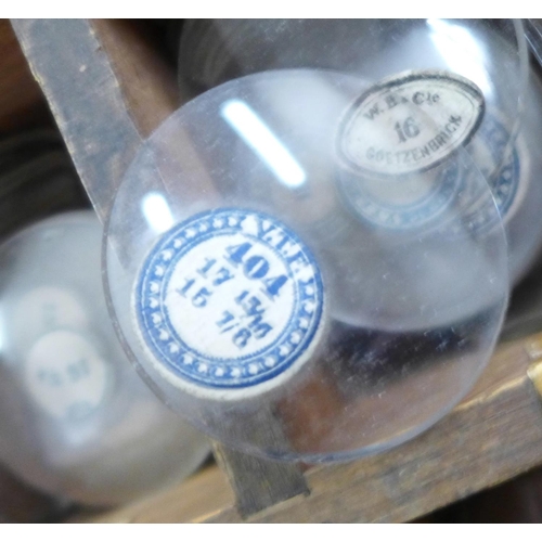 701 - A large tray of pocket watch glasses