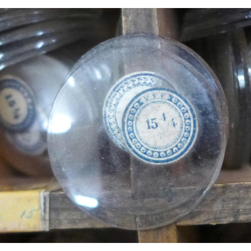 701 - A large tray of pocket watch glasses