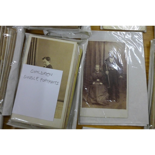 714 - A collection of approximately 500 circa 1900 photographs, cabinet cards, CDV's and Stereoview cards