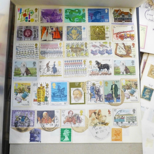 754 - A collection of stamps and a reference book