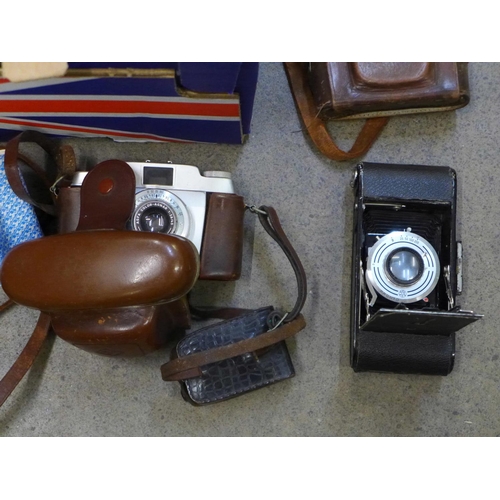 756 - Two cine cameras, Bell & Howell and Chinon, two cameras, Halina, Agfa and three folding cameras with... 