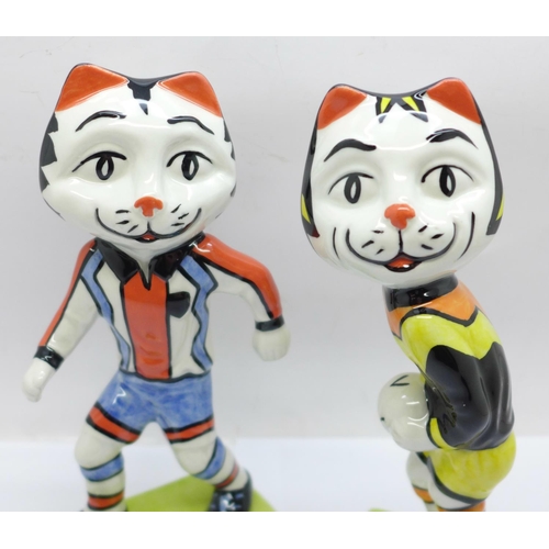 764 - A Lorna Bailey Pottery, Striker and Goalkeeper Cats figures from the Football World Cup Collection, ... 