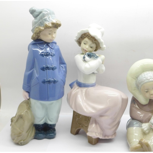 766 - Four Nao by Lladro figurines, 'Listening to the Birds Song' (Nao ref. 02001042), 'A Big Hug' (Nao re... 