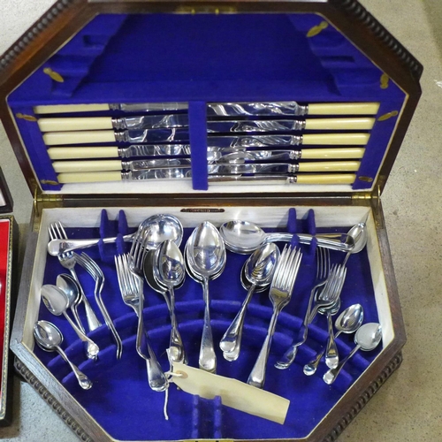 800 - A set of six horn handled steak knives and forks, cased, one other set of six horn handled steak kni... 