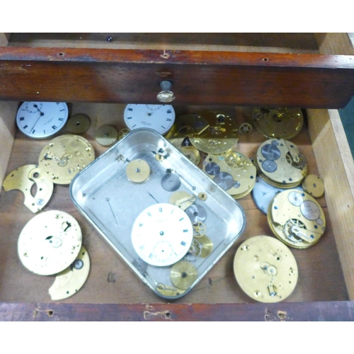 805 - A watchmaker's chest of eight drawers, some with contents