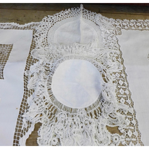 806 - A collection of antique lace, four table cloths, (38