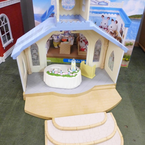 811 - A Sylvanian Families Adventure Treasure Ship and Seaside Restaurant, both boxed and two part buildin... 