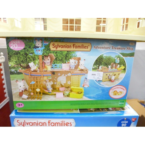 811 - A Sylvanian Families Adventure Treasure Ship and Seaside Restaurant, both boxed and two part buildin... 