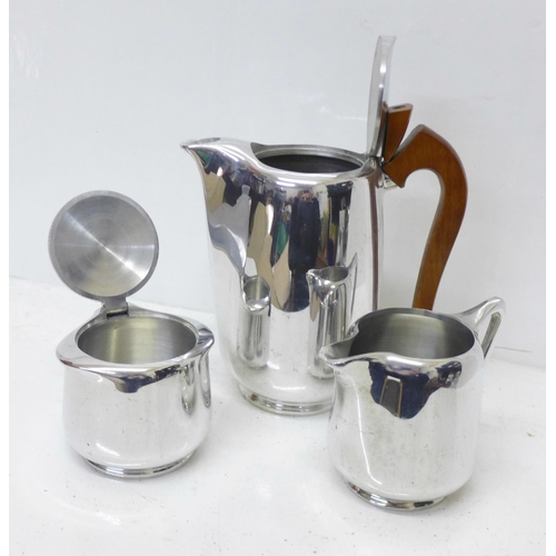 817 - A three piece polished alloy tea service, Piquot ware and Newmaid