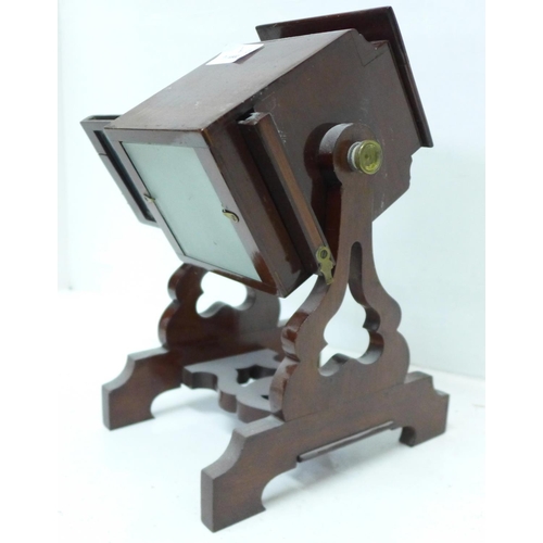 818 - A mahogany lantern slide viewer, with slide carrier and a collection of slides, the viewer marked Ad... 