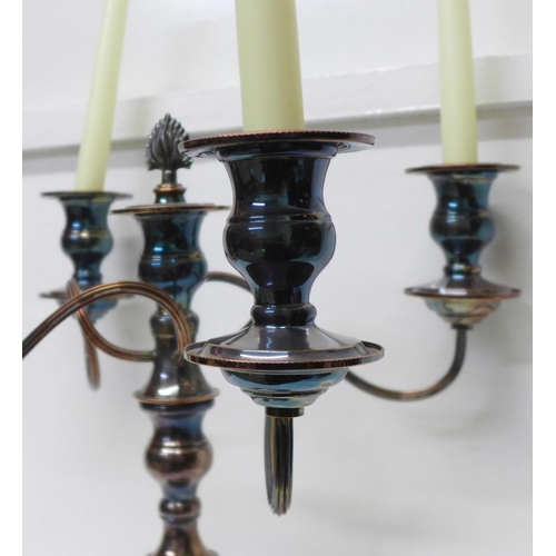 821 - A silver plate on copper four branch candelabra