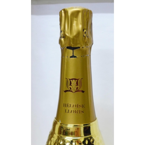 825 - A bottle of Héloise-Lloris Tete de Cuvée 1998 vintage Champagne 150cl, the bottle finished in 24k go... 