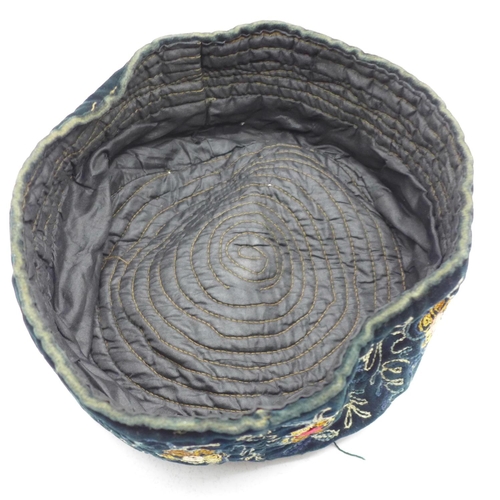 826 - An embroidered smoking hat