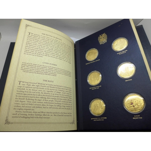 847 - A folder of The Churchill Centenary Medals, minted by John Pinches Medallists Ltd., twenty-four silv... 