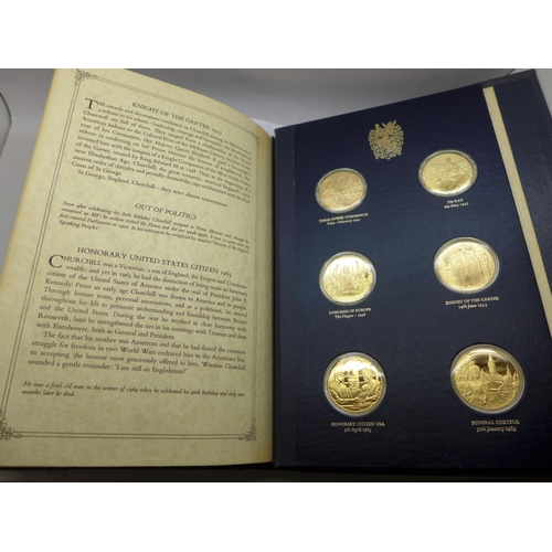 847 - A folder of The Churchill Centenary Medals, minted by John Pinches Medallists Ltd., twenty-four silv... 