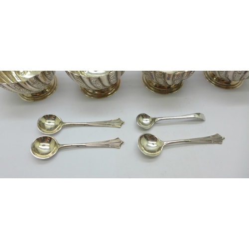 853 - A set of four Victorian silver salts with three matching spoons by Josiah Williams & Co., (George Ma... 