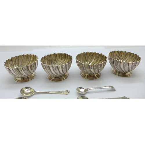 853 - A set of four Victorian silver salts with three matching spoons by Josiah Williams & Co., (George Ma... 