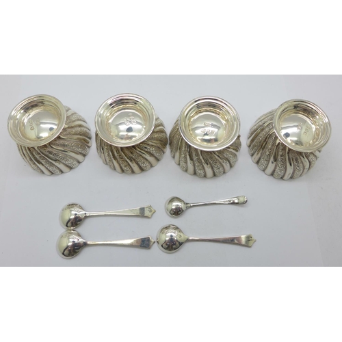 853 - A set of four Victorian silver salts with three matching spoons by Josiah Williams & Co., (George Ma... 