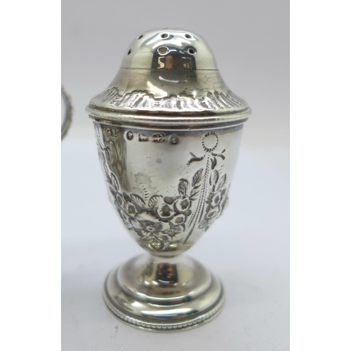 856 - A pair of Victorian silver pepper pots by George Unite and a white metal mustard pot, lid loose, hin... 