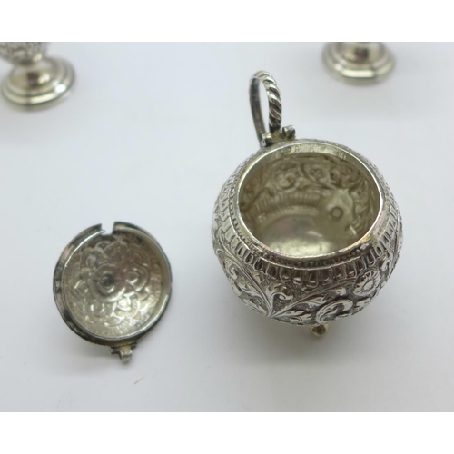 856 - A pair of Victorian silver pepper pots by George Unite and a white metal mustard pot, lid loose, hin... 