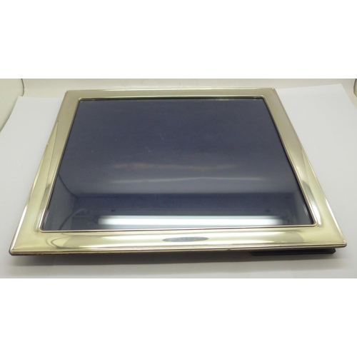 876 - A silver photograph frame, by Carrs, 24cm x 29cm