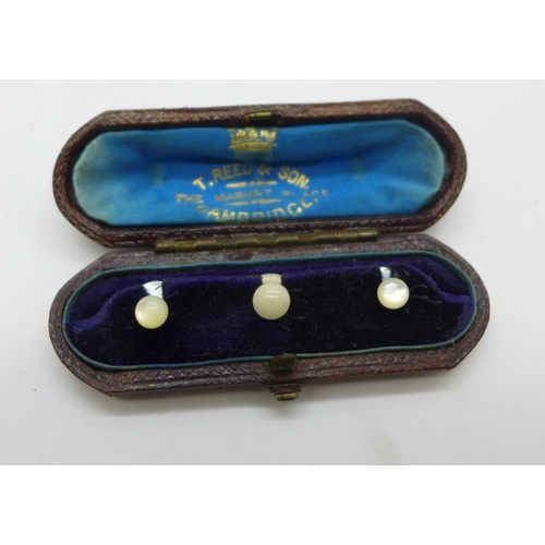 879 - A top-wind pocket watch, cased mother of pearl studs and a vesta case, (watch with screw front case)