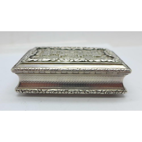 907 - A William IV silver castle top table snuff box depicting Windsor Castle by Nathaniel Mills, Birmingh... 