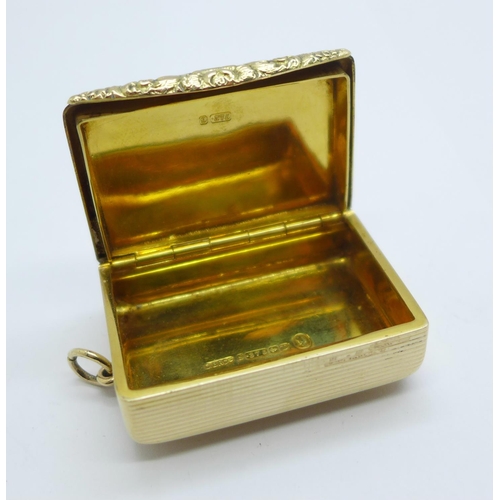 920 - A hallmarked 9ct gold snuff box, Birmingham 1953, 35g, width 44mm, shallow dent to one side