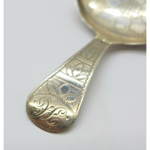 926 - A George III silver caddy spoon, Birmingham 1810