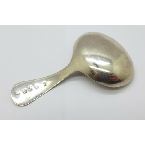 926 - A George III silver caddy spoon, Birmingham 1810