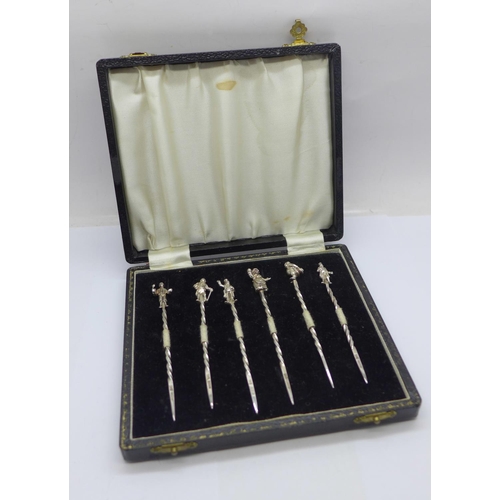 932 - A cased set of six silver Charles Dickens character cocktail sticks, Birmingham 1966