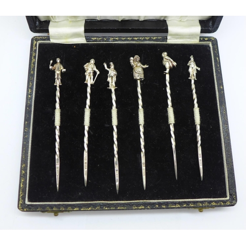 932 - A cased set of six silver Charles Dickens character cocktail sticks, Birmingham 1966