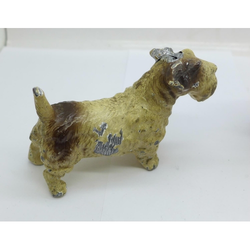 948 - Three cold painted dog figures, a/f