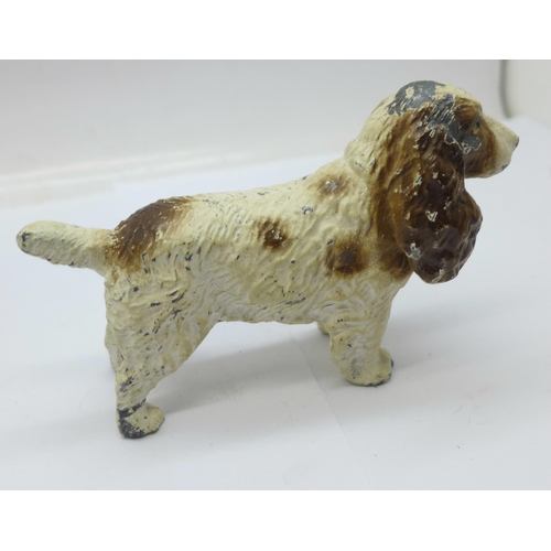 948 - Three cold painted dog figures, a/f