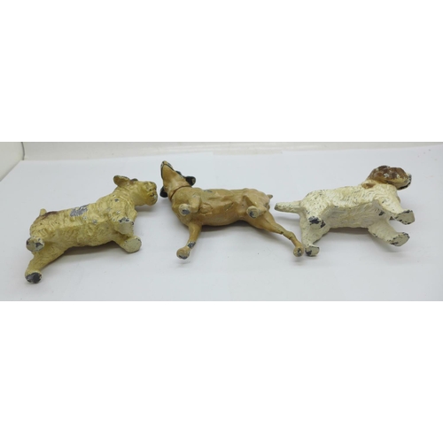 948 - Three cold painted dog figures, a/f